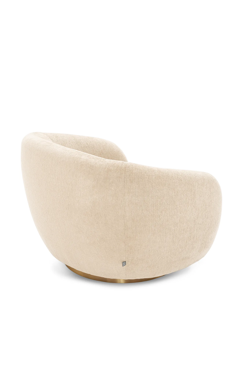 Brass Base Curved Swivel Chair | Eichholtz Brice | Eichholtzmiami.com