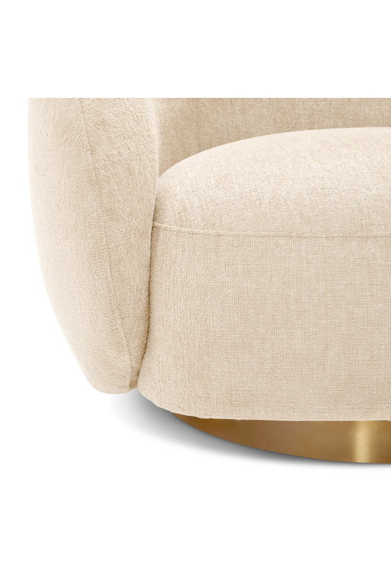 Brass Base Curved Swivel Chair | Eichholtz Brice | Eichholtzmiami.com